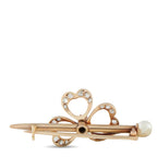 Yellow gold clover brooch with diamond rings and white pearl ball pin