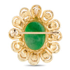 Green jade cabochon pendant with yellow gold scroll frame and diamond accents