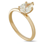 14K yellow gold solitaire ring with oval diamond and four-prong setting
