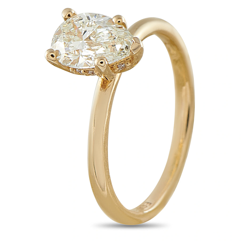 14K yellow gold solitaire ring with oval diamond, four-prong top view