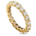 Yellow gold diamond eternity band with round prong-set stones