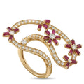 14K yellow gold ring with ruby marquise stones and diamond accents, open swirl design