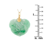 Heart-shaped green jade pendant with 14K gold bail, shown with size ruler
