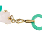 14K yellow gold bracelet detail with square rose quartz stone and green oval links