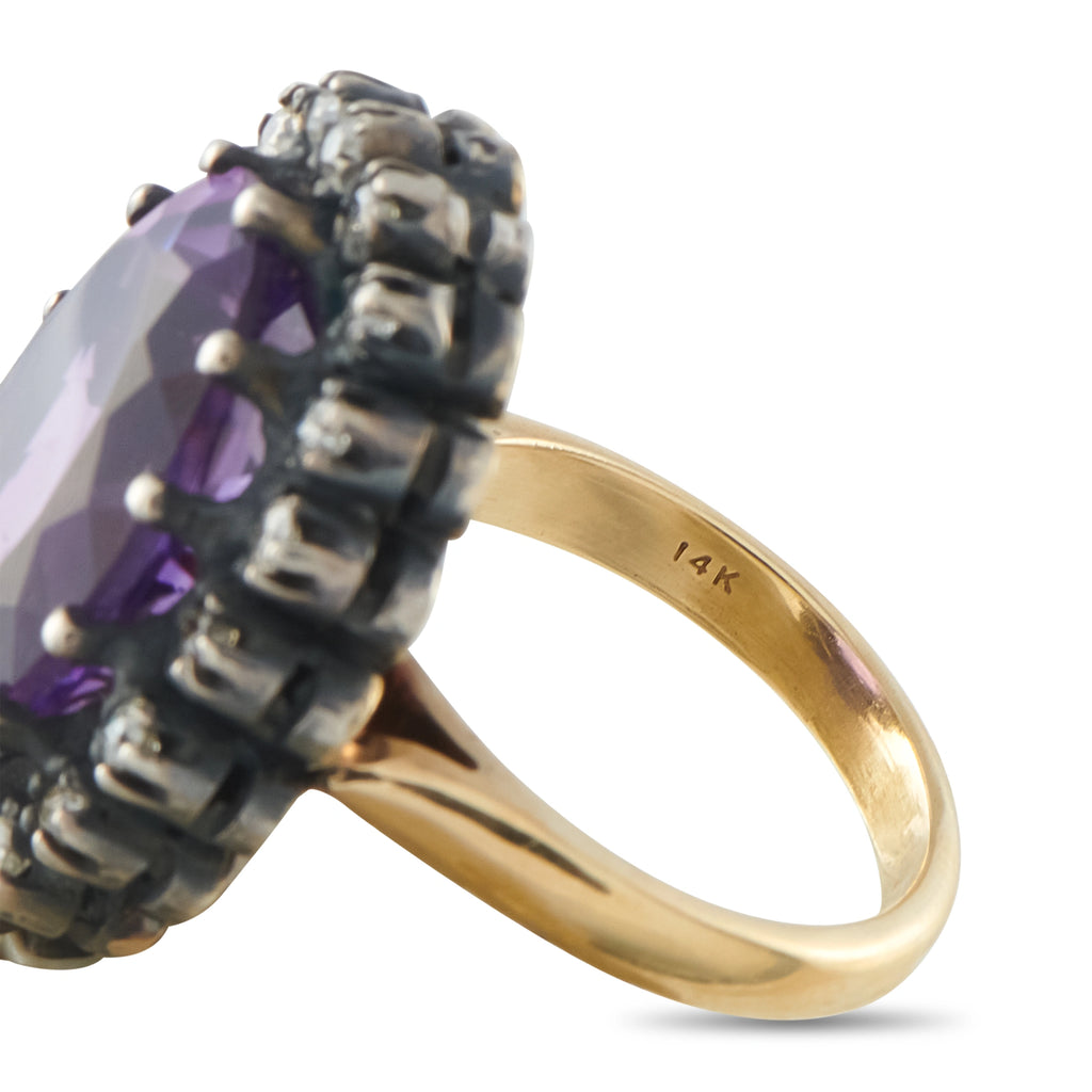 14K yellow gold ring band stamped 14K with dark prong-set amethyst