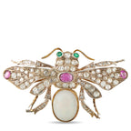 14K yellow gold and silver bee brooch with diamonds, opal, ruby, and green stones