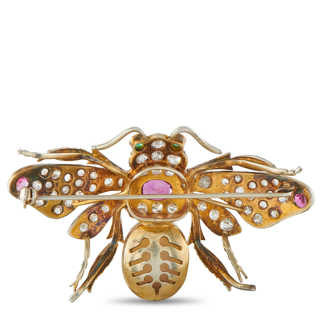 Bee brooch in yellow gold and silver with diamonds, opal, and ruby accents