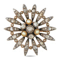 Antique starburst brooch with diamond-like stones and white pearls in gold-tone settings