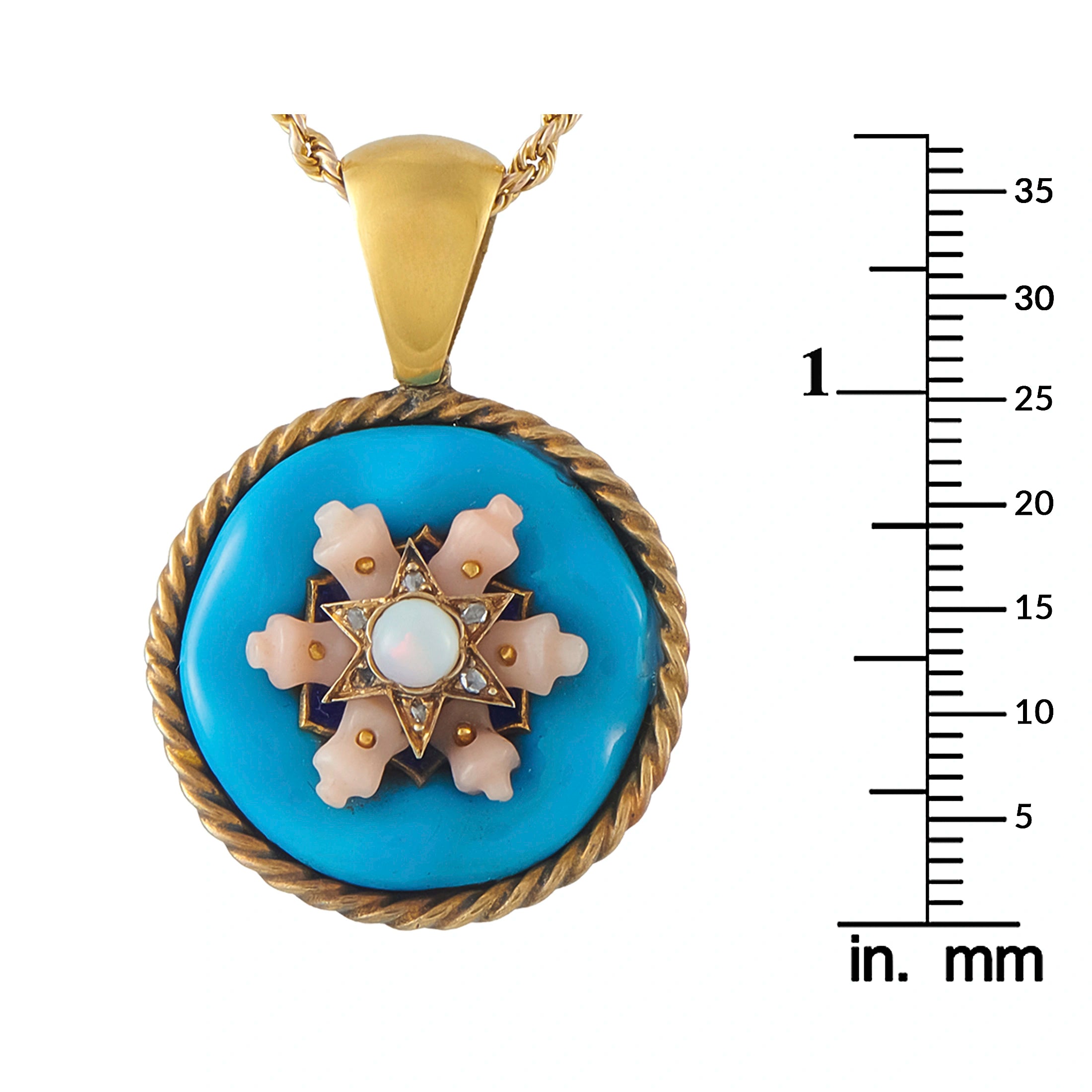 Gold tone round pendant necklace with blue enamel floral design and rope rim