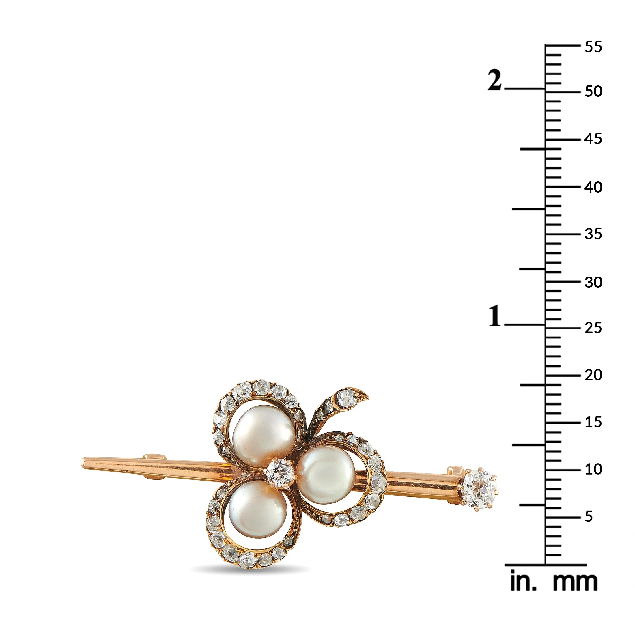 Rose gold flower brooch with three white pearls, diamond halo, and in. mm scale