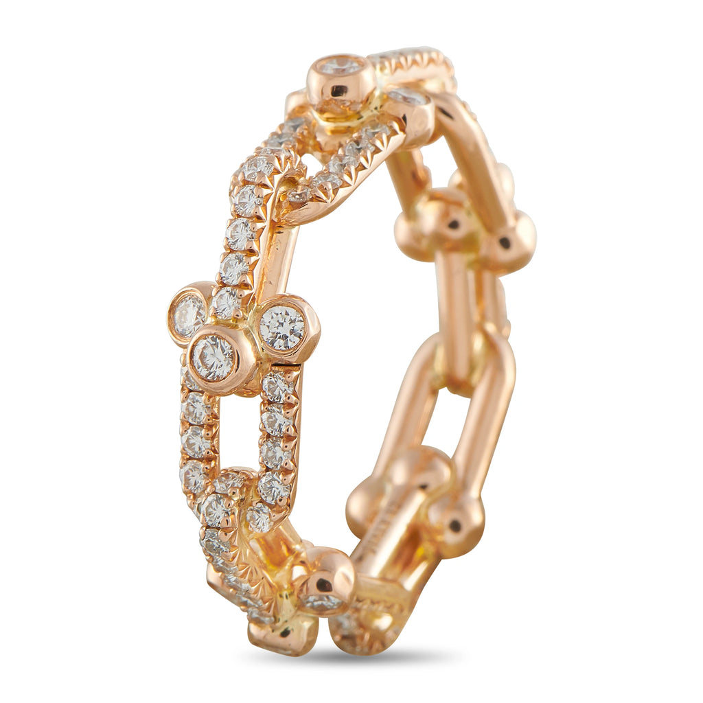 Rose gold diamond band with round pave stones and scalloped open framework