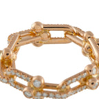 Rose gold diamond band close-up showing inner rail and linked bezel settings