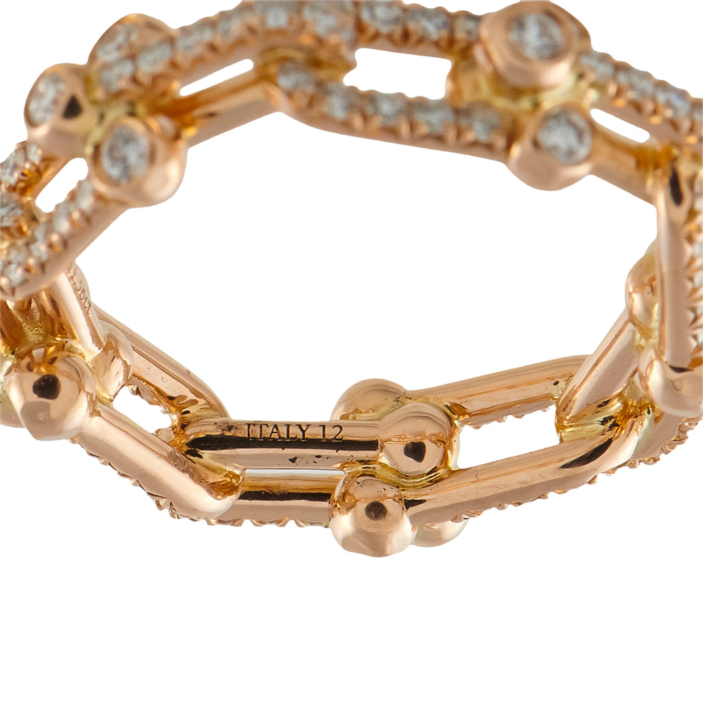 Rose gold diamond band close-up of inner engraving 'ITALY 12' with pave stones