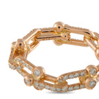 Rose gold diamond band close-up of inner rail marked 'T&Co' with pave stones