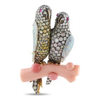 Lovebirds brooch with diamond pavé, opal wings, and pink conch pearl perch