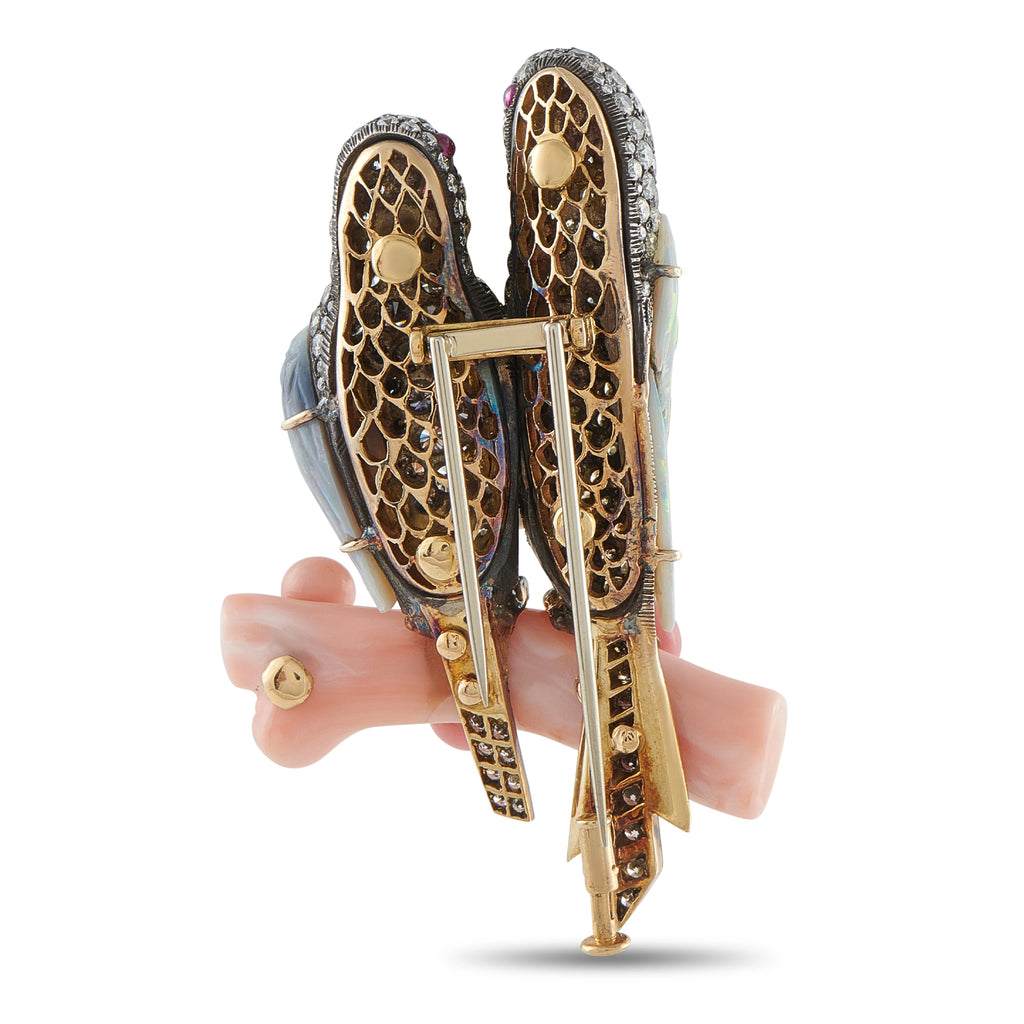 Lovebirds brooch with pavé wings, opal bodies, and pink conch pearl branch