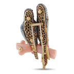 Lovebirds brooch with pavé wings, opal bodies, and pink conch pearl branch