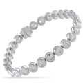 18K white gold diamond bracelet with round bezel-set stones, hinged links