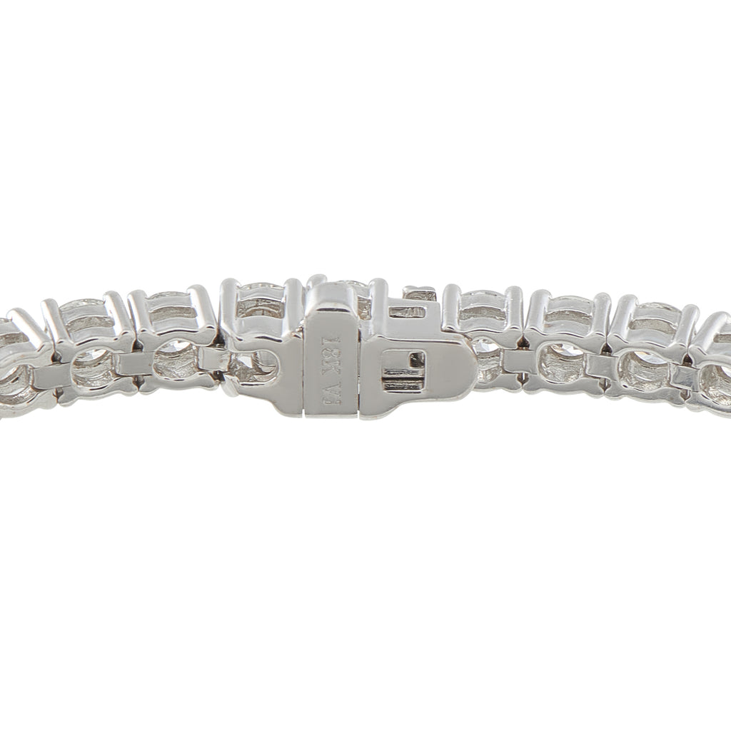 White gold diamond tennis bracelet with clasp and linked pave stones