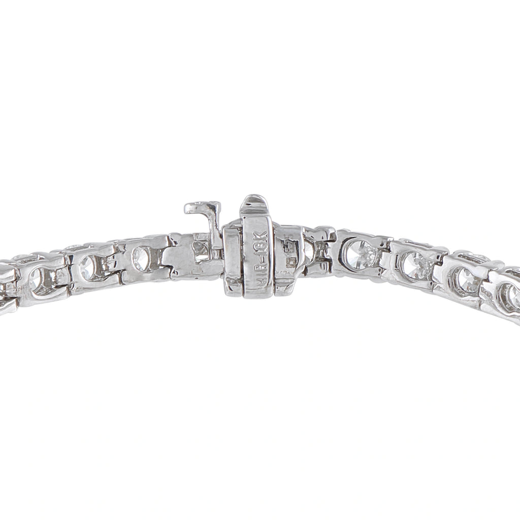 White gold diamond tennis bracelet with box clasp and linked prong-set stones