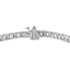 White gold diamond tennis bracelet with box clasp and linked prong-set stones