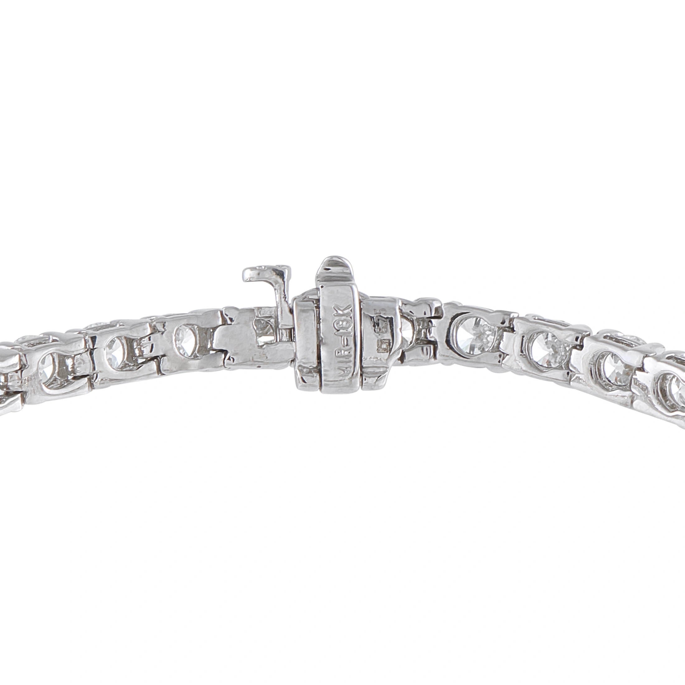 White gold diamond tennis bracelet with box clasp and linked prong-set stones