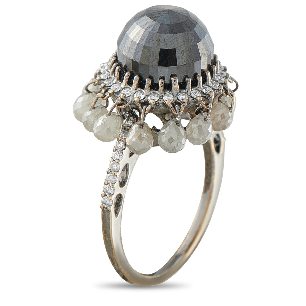 18K white gold diamond ring with dark oval center, white diamond prongs and dangling stones