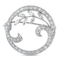 18K white gold diamond brooch with round frame, leaf and scroll motifs