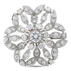 White gold diamond cluster flower brooch with round center stone and marquise accents