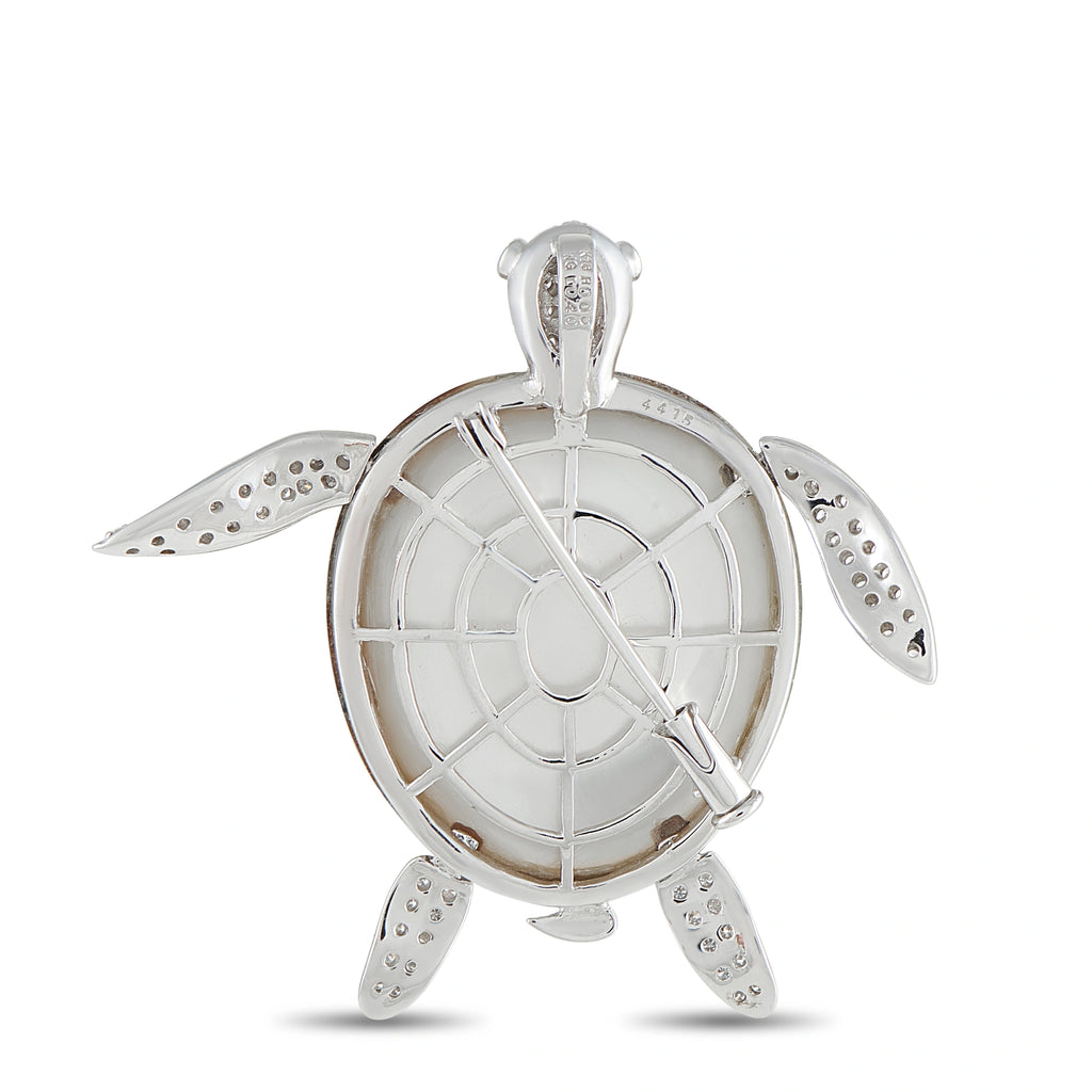 White gold turtle brooch with mother-of-pearl shell and diamond accents