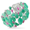 Silver-tone garden bracelet with green gemstone leaves and pink accents, diamond highlights