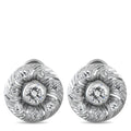 Teardrop swirl diamond stud earrings in white gold, with one center round stone