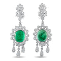 Diamond halo drop earrings with green oval emerald center in white gold, dangling teardrops