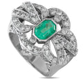 18K white gold ring with emerald-cut emerald center and round diamond halo