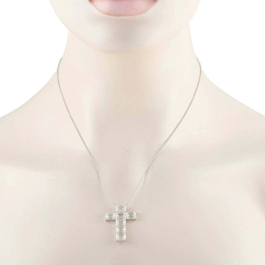 Diamond cross pendant necklace shown worn, with baguette-cut stones in white gold