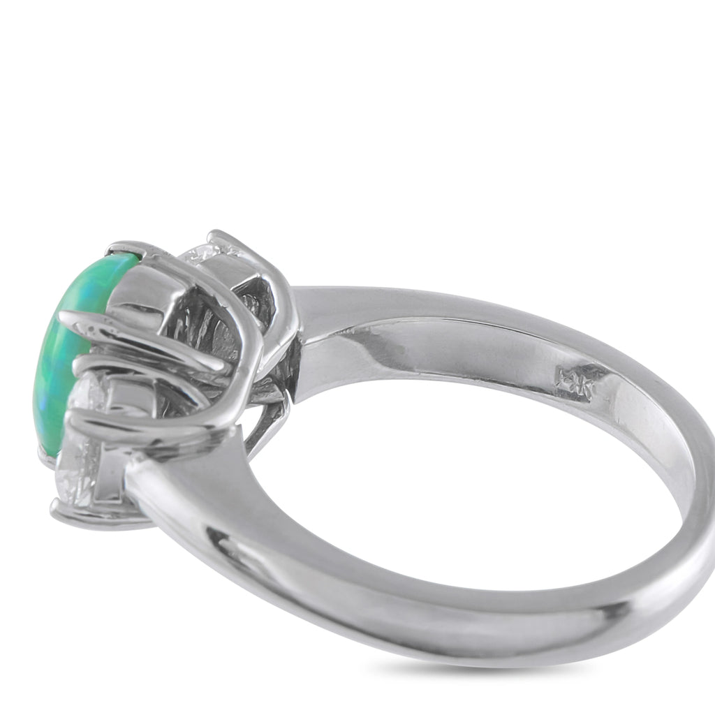 White gold ring profile with green opal prong-set and round diamond side stones