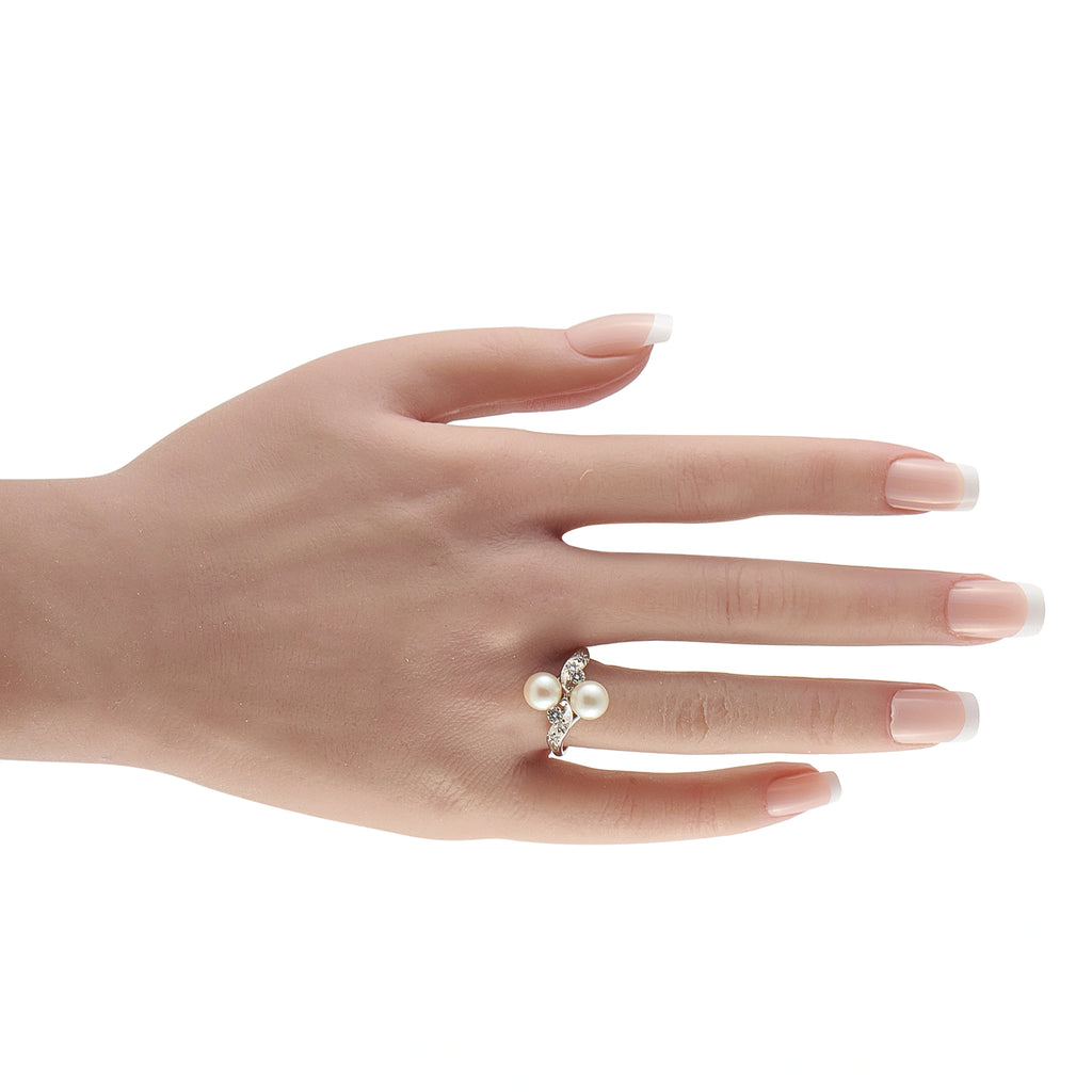 Vintage 18K White Gold 0.16ct Diamond and Pearl Bypass Ring