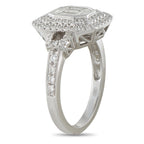 18K white gold diamond halo ring with emerald-cut center and side prong details