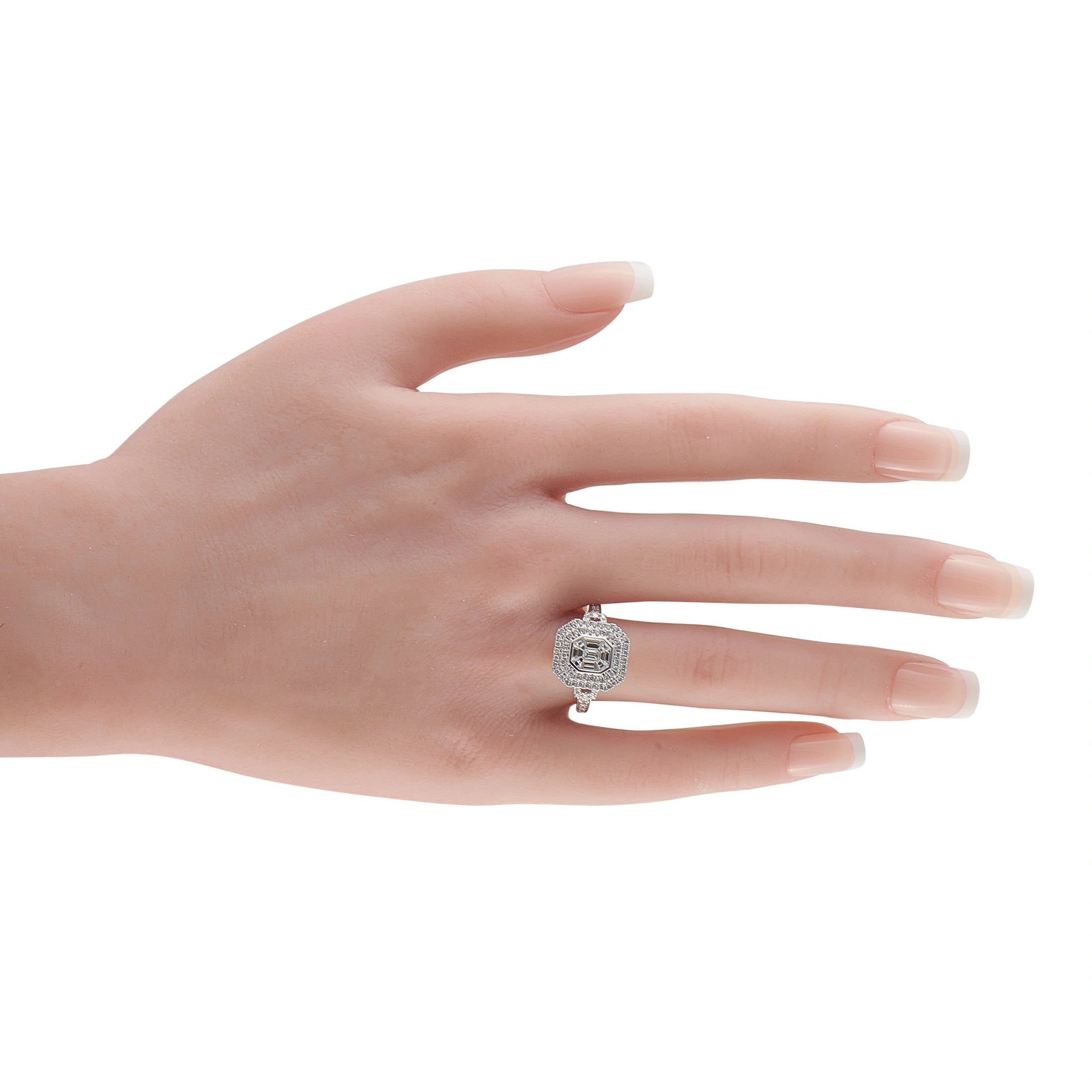18K white gold diamond halo ring on a hand