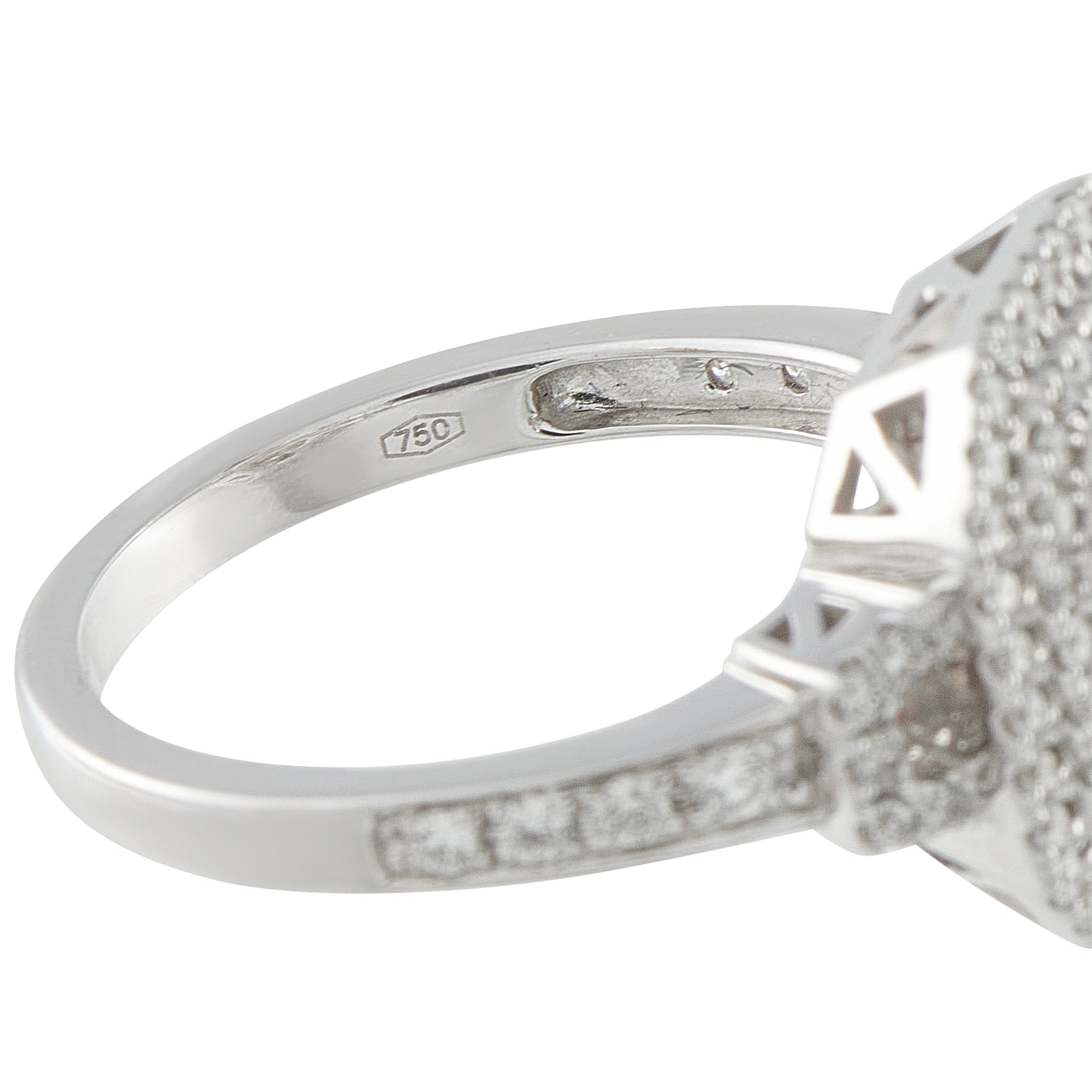 18K white gold diamond halo ring close-up of inside band hallmark and setting