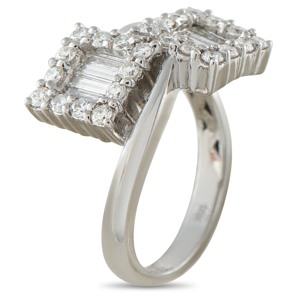 18K white gold diamond bypass ring, side view showing baguette and round diamond accents