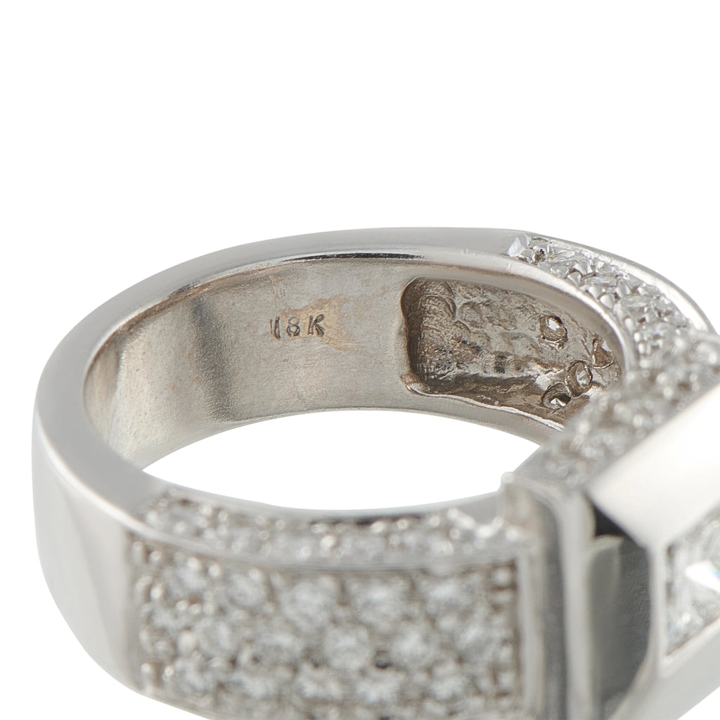 18K white gold diamond ring with pavé band and visible 18K stamp