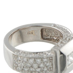 18K white gold diamond ring with pavé band and visible 18K stamp