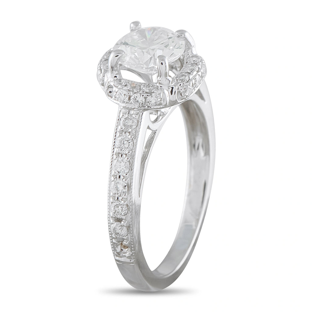 18K white gold diamond halo engagement ring with round center stone and pavé band