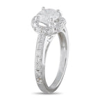 18K white gold diamond halo engagement ring with round center stone and pavé band