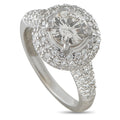 18K white gold diamond ring with round center stone and textured halo setting