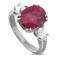 18K white gold ring with oval pink rubellite and diamond accents, prong-set
