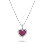 White gold heart pendant with ruby center and diamond halo on a chain