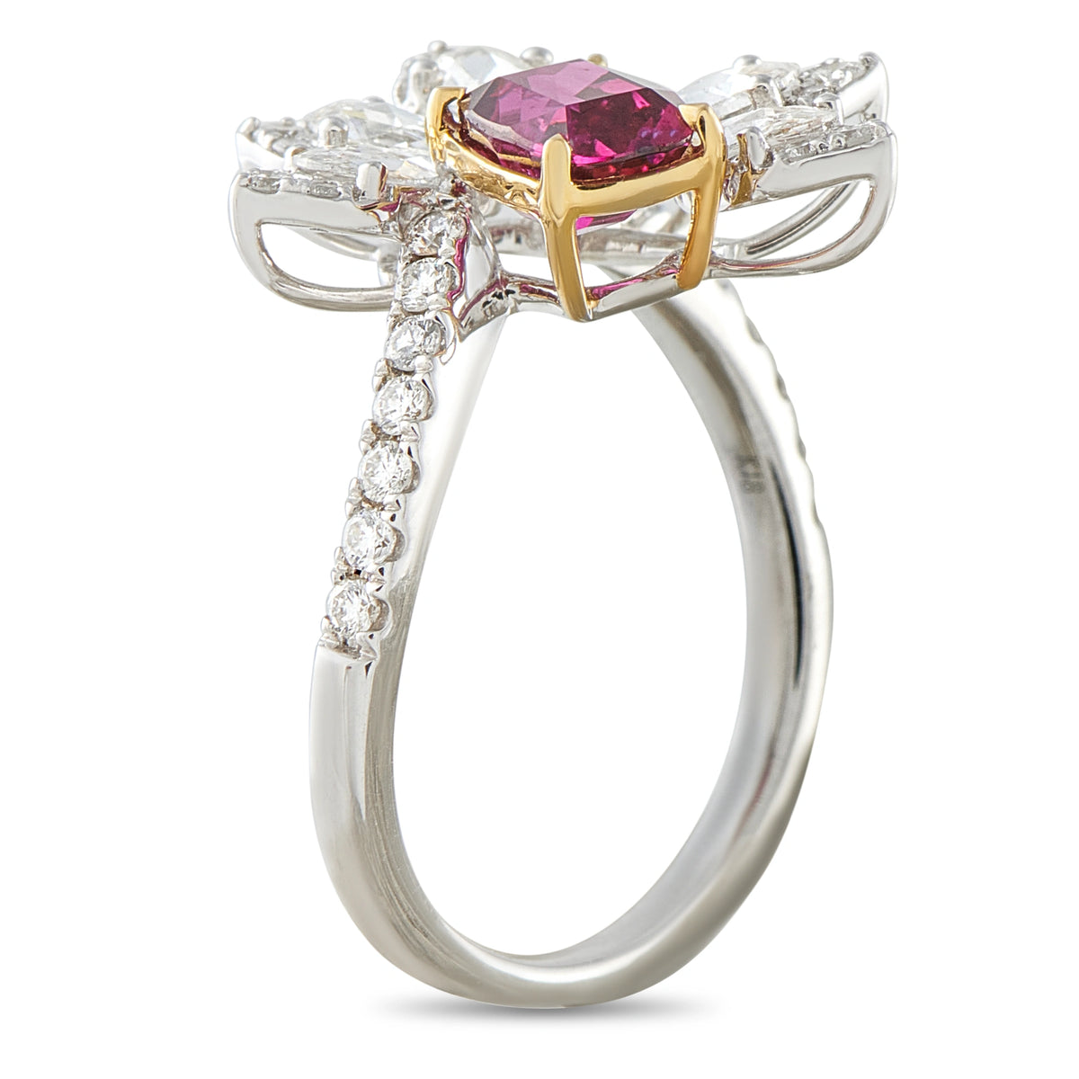 18K white gold ring with a pink ruby in a gold-tone setting and diamonds along the band