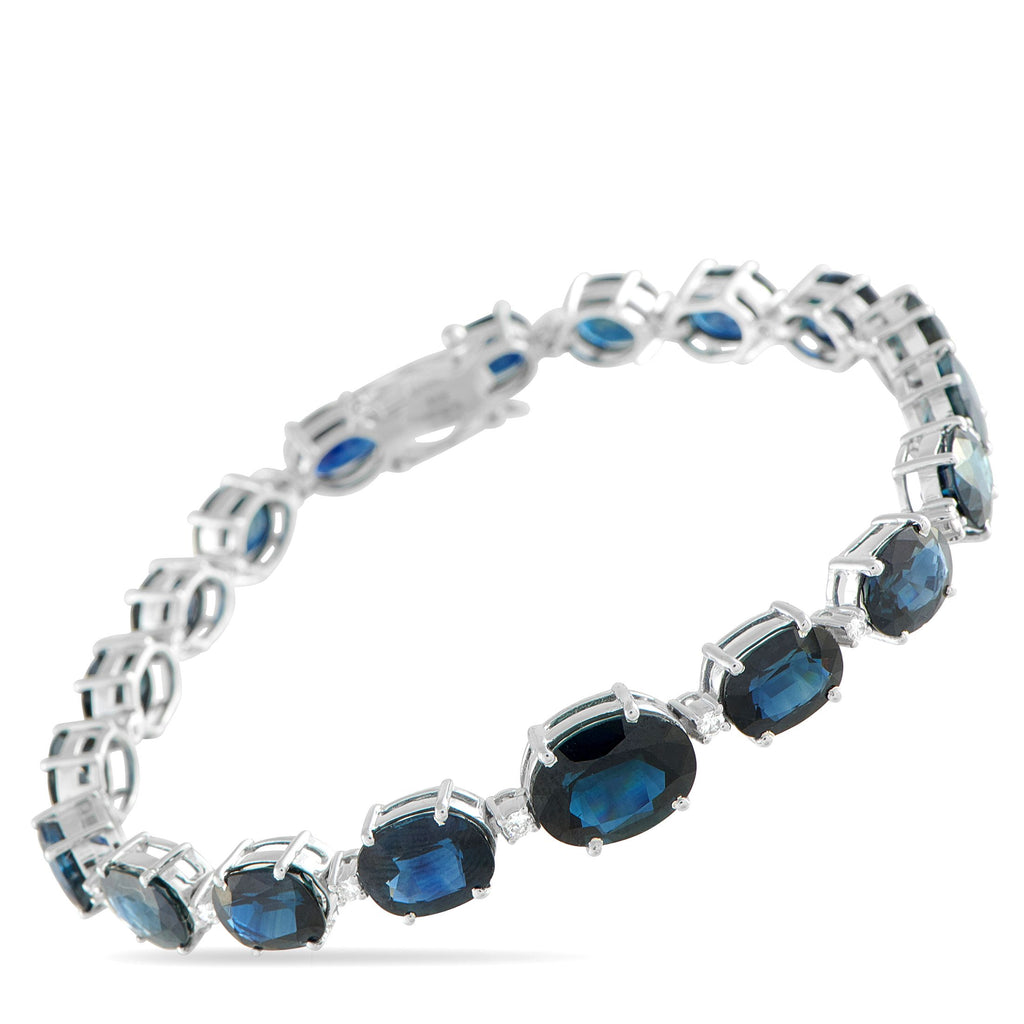Exclusive White Gold 0.32ct Diamond and Sapphire Bracelet #5203 – Elegant in proportion and fluid in form, this Exclusive  br